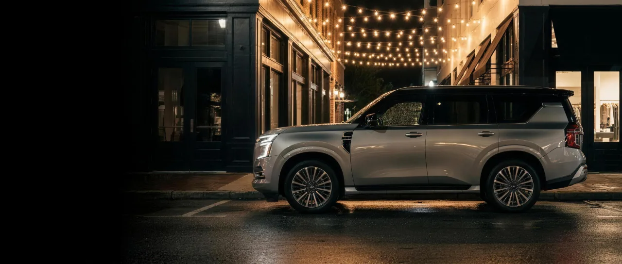 DFG fleet full-size SUV on an upscale Tampa street at night